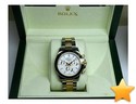 Montre Rolex DAYTONA, or et acier, cadran fond blanc. JAMAI...
