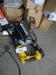 12-	Perceuse HYNDAI, perceuse sans fils DE WALT et lampe de chantier