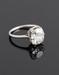 Bague solitaire en or gris ornée d'un diamant coussin taille ancienne